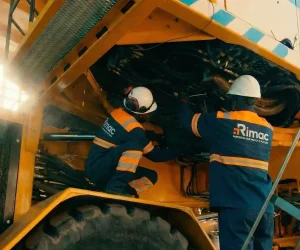 Firefly_GeminiFlash_rebuild-workers-scene-with-the-new-orange-and-blue-uniform.-Preserve-exact-same-color-841584.png-scaled-e1773405359584[1]
